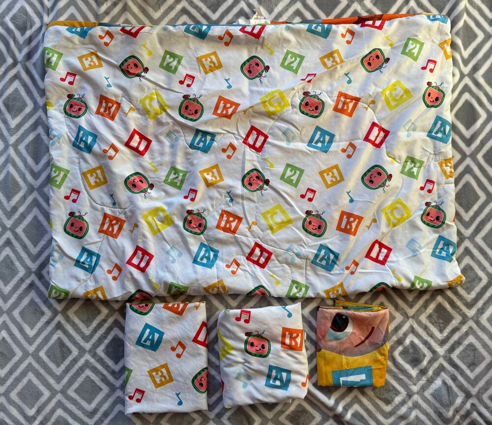 Cocomelon 4 Piece Toddler Bedding Set with Reversible Comforter